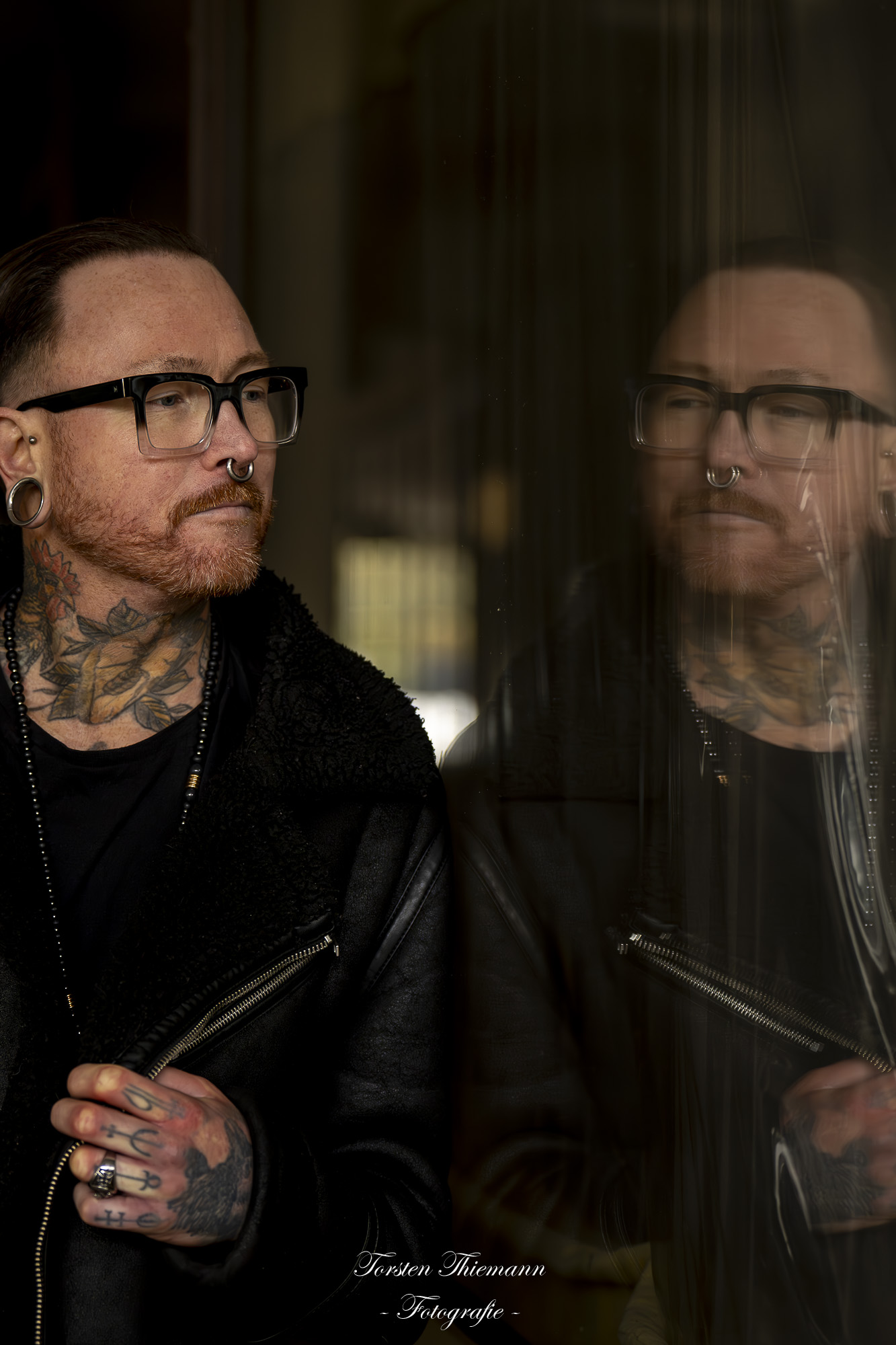 Männliches Modell mit Tattoos