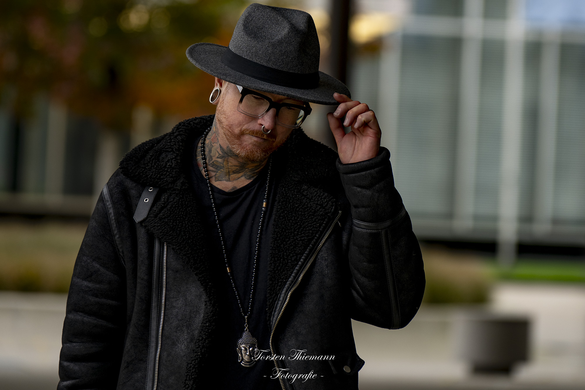 Männliches Modell mit Tattoos